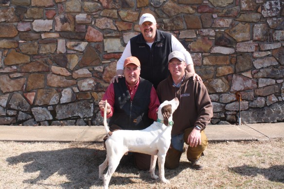 Scout Eddy Taylor and handler Stacy Perkins with 2014 Invitational Champion Not'ta Snow Ball's Chance.  Back:  Owner Rex Garner
